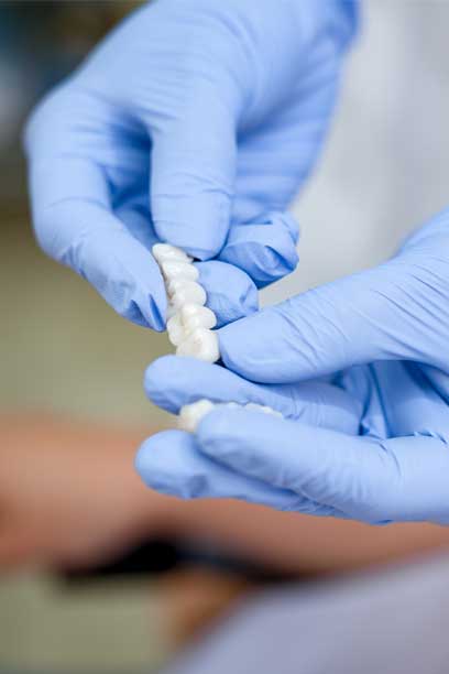 new-jersey-dentist-holding-porcelain-veneers